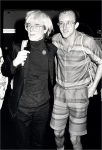 Andy Warhol and Keith Haring during Andy Warhol and Keith Haring at the Palladium - July 26, 1985 at The Palladium in New York City, New York, United States. (Photo by Ron Galella, Ltd./WireImage)